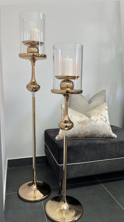 Empire gold floor candle holders