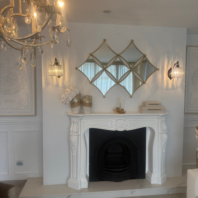 Diamond shaped wall mirror