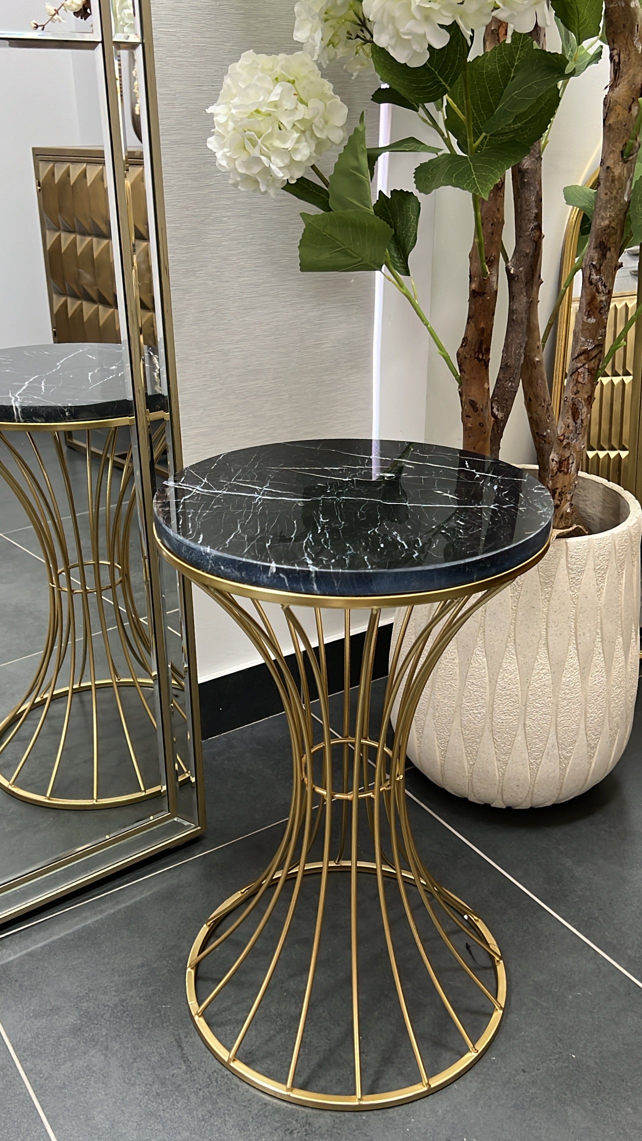 Marble black gold round side table