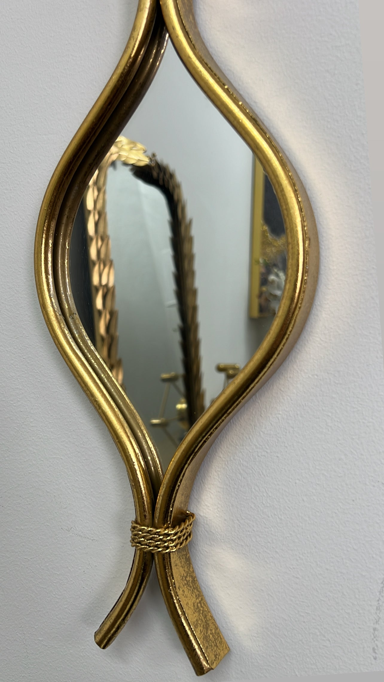 Gold teardrop wall mirror