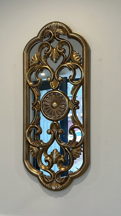 Ornate vintage handcarved oval mirror
