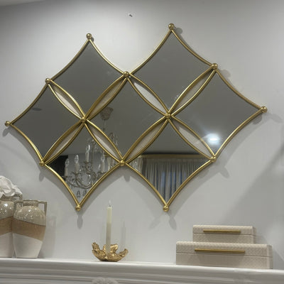 Diamond shaped wall mirror