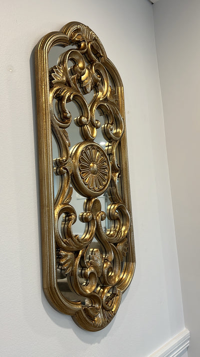 Ornate vintage handcarved oval mirror