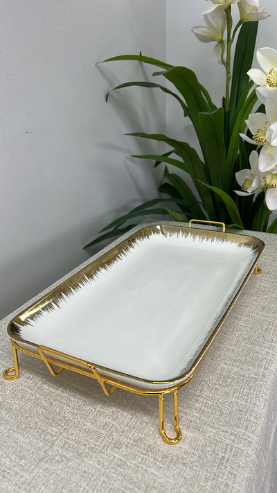 gold and white rectangular rack serving platter