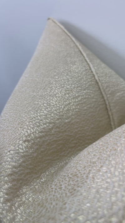 Gracious light gold cushion